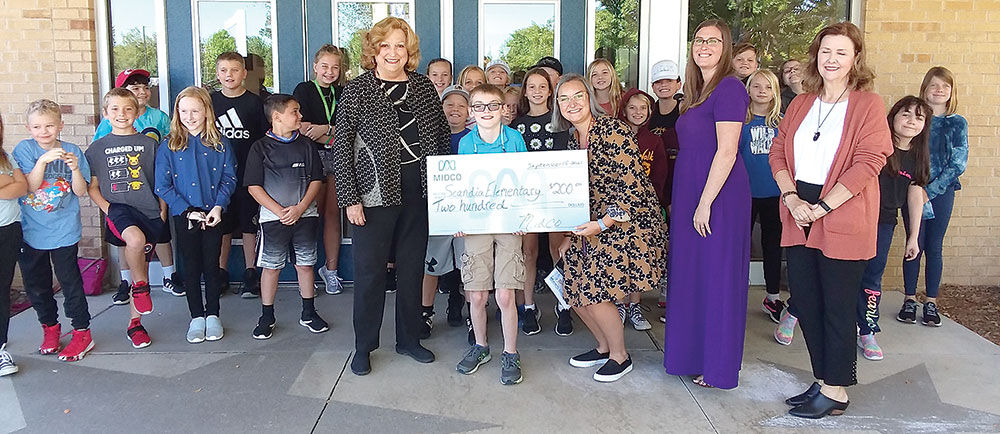 Giant Check Award from Midco